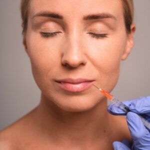 Professional lip filler consultation at an aesthetic clinic in Newmarket for natural-looking lip enhancement
