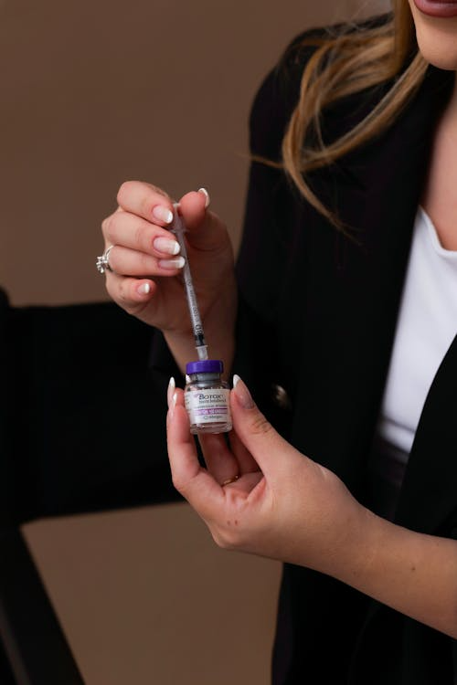 Patient receiving professional Botox injection at Newmarket aesthetic clinic