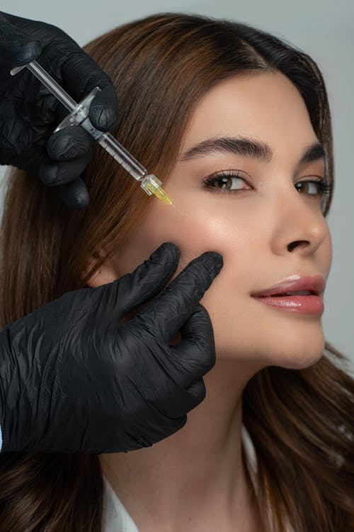 Natural-looking dermal filler treatment enhancing facial contours and restoring youthful volume